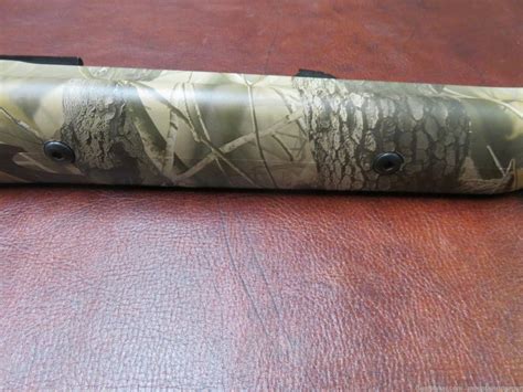 Thompson Center Impact 50 Caliber Muzzleloader Realtree Hardwoods Camo Black Powder Rifles