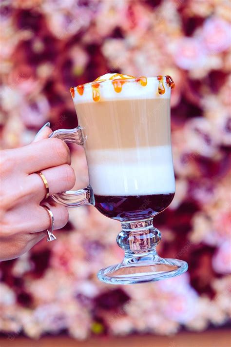 Premium Photo Iced Coffee With Milk Iced Coffee Latte Woman Holding Glass Cup Of Iced Coffee