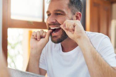 Should You Floss Before or After Brushing? | livestrong