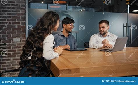 Three Diverse Business Partners Multiracial Work Group Team Developing