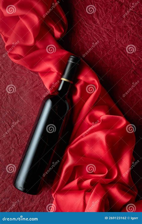 Bottle of Red Wine on a Red Background Stock Photo - Image of curve ...