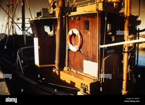 Deck and cabin on old fishing boat Stock Photo - Alamy