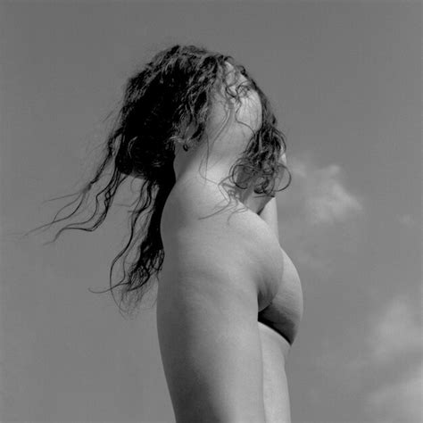 Premium Photo Low Angle View Of Naked Woman Standing Against Sky