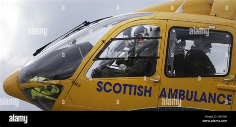 A Scottish Ambulance Service Helicopter Air Ambulance Lands In