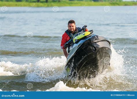 BRP Sea-Doo Jet Ski Watercraft Driver Drives Water Bike Splashing at ...