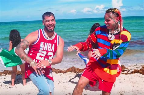 6ix9ine Anuel AAs âBebeâ Lyrics Translated to English