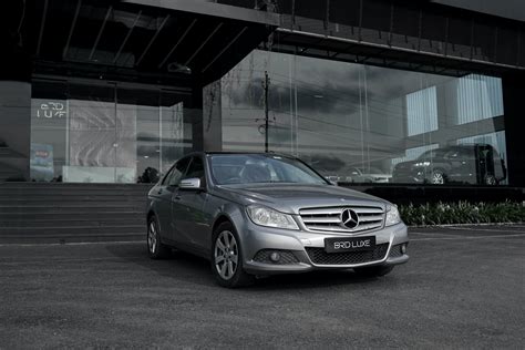 Black Mercedes-Benz AMG GT Car Parked in a Urban Yard · Free Stock Photo