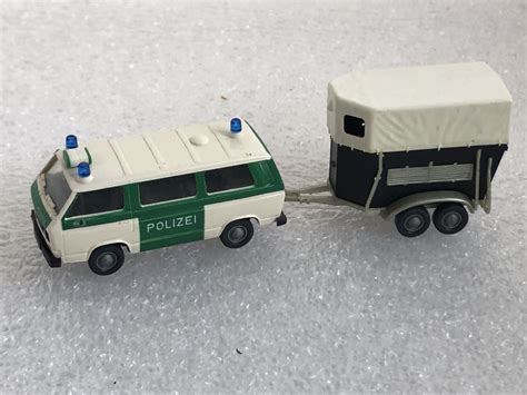 Roco Miniatur Modell 1484 VW Typ 2 T3b Syncro Polizei Mit