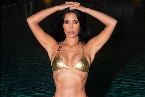 Kim Kardashian Heats Up Instagram In Golden Dolce Gabbana Bikini