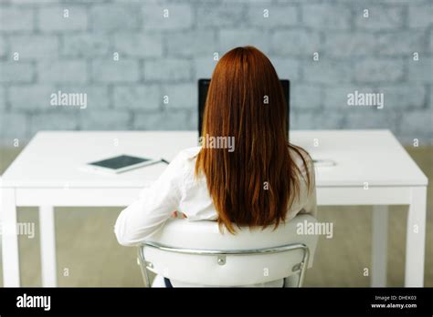 Person Sitting Behind Desk Hi Res Stock Photography And Images Alamy