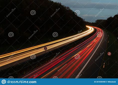 Beautiful And Colorful Long Exposure Of The Driving Cars On The Highway