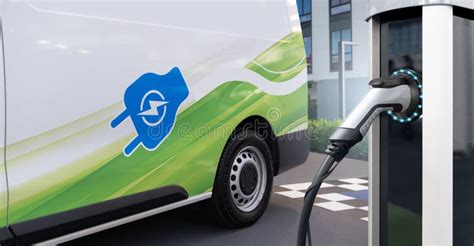 Electric Delivery Van with Charging Station. Stock Photo - Image of ...