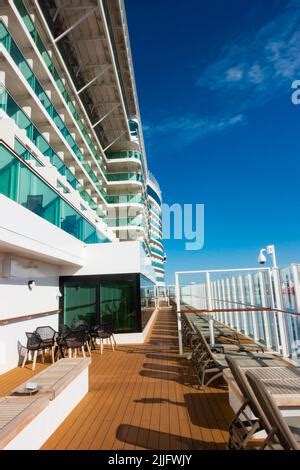 Promenade deck and glass fronted balcony cabins. MS Iona. P&O cruise ...