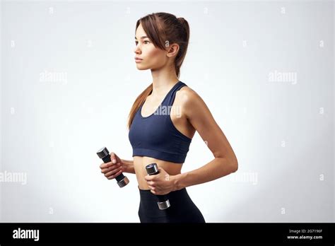 Pretty Brunette Slim Figure Strength Exercises Dumbbells Fitness Stock Photo Alamy