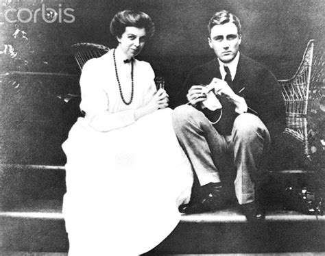 an old black and white photo of two people