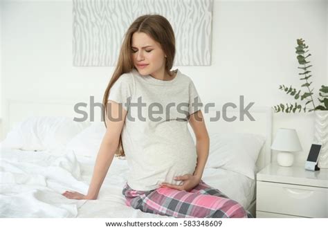 Young Pregnant Woman Suffering Abdominal Pain Stock Photo 583348609 | Shutterstock