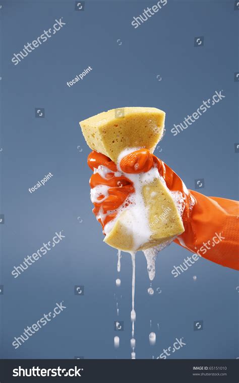 Squeezing Sponge Squeezing Wet Sponge Stock Photo 65151010 Shutterstock