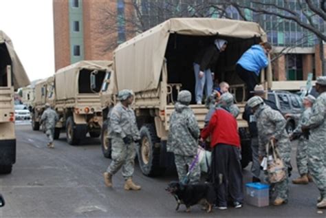 Soldiers Assist Residents Displaced By Hurricane Sandy