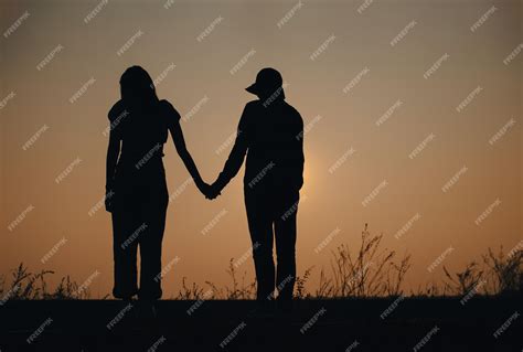 Two Girls Holding Hands Silhouette