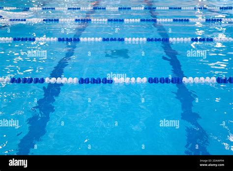 Background Fragment Of The Competition Pool With Blue Water And