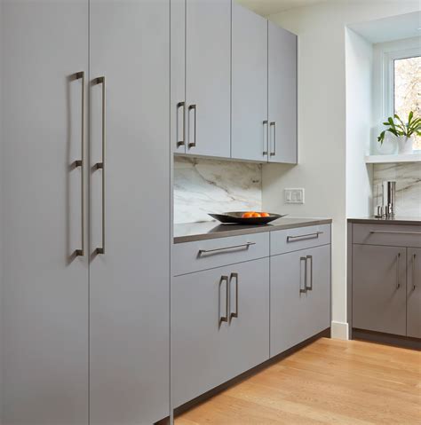 Contemporary L-shaped Kitchen - Access by Cabinet Joint