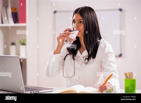 Doctor drinking water hi-res stock photography and images - Alamy