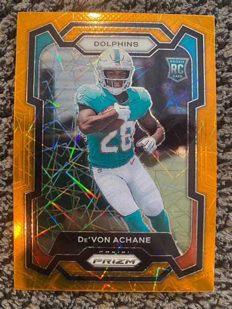 2023 Panini Prizm Football Devon Achane Orange Lazer RC Rookie 365