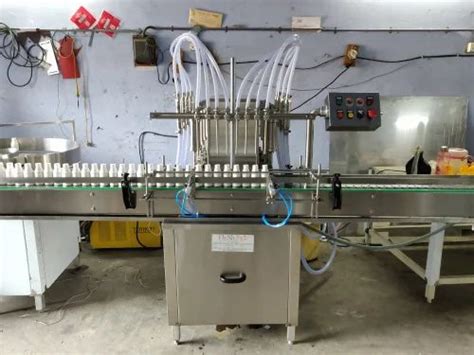 Liquid Filling Machine Phenyl Filling Machine Manufacturer From Ahmedabad