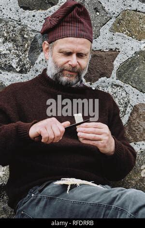 A Faroe islander wearing a traditional Faroese wool sweater and hat in ...