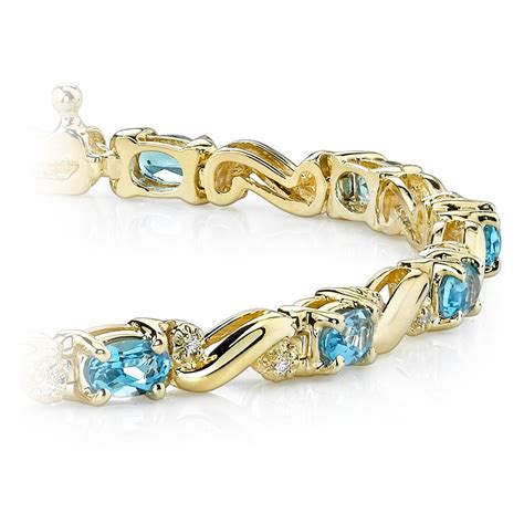 Blue Topaz Bracelet In Gold With Diamonds 4 Ctw