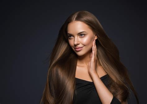 Premium Photo Beautiful Brunette Woman In Black Dress Long Beauty Smooth Hair Touching Her