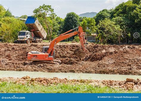 Backhoe On The Construction At Digging The Pit Editorial Image Image