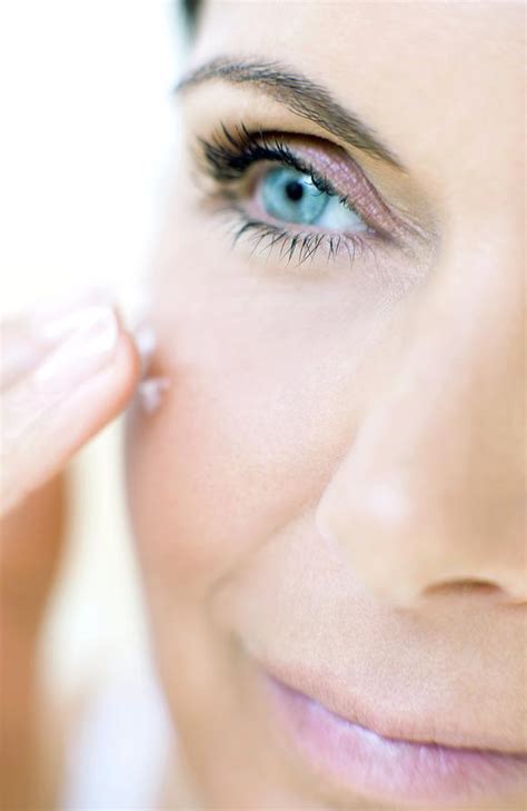 Woman Applying Face Cream Photograph By Ian Hootonscience Photo Library Fine Art America