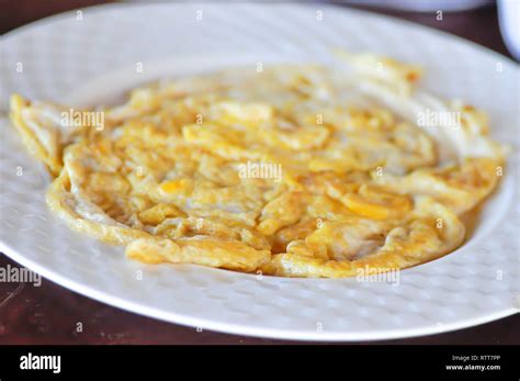 Fried Beaten Egg Or Omelet Or Omelette Stock Photo Alamy