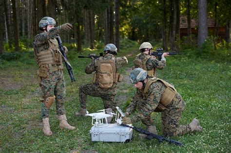 Premium Photo Soldiers Squad Are Using Drone For Scouting