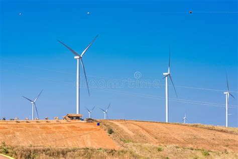 Power Of Wind Turbine Generating Electricity Clean Energy With Cloud