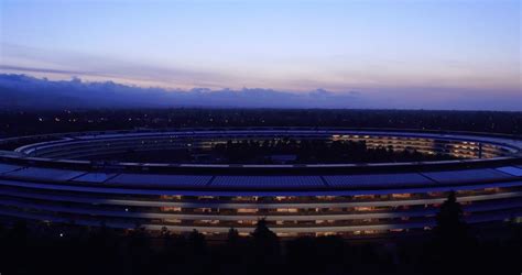 Check out breathtaking aerial views of Apple Park building lit up at night