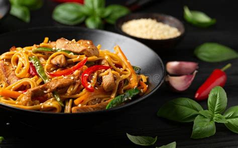 Stir Fry Chow Mein Noodles With Pork And Vegetable In Black Bowl Asian