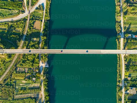 Aerial View Of Bridge Crossing The Neretva Delta Valley River Near