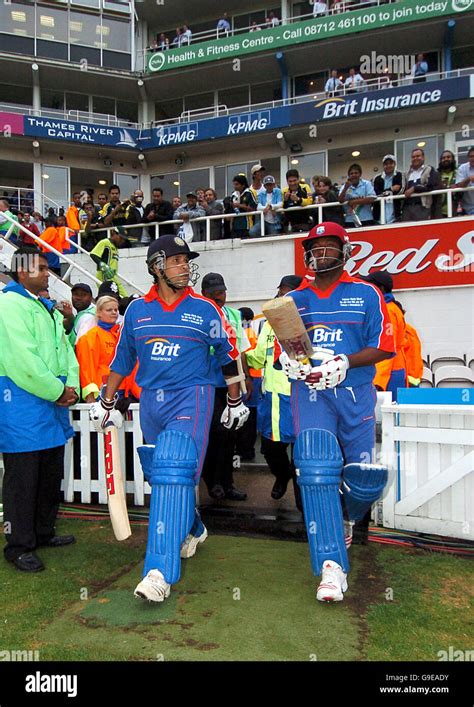 International XI S Sachin Tendulkar And Brian Lara Walk Out To Bat In