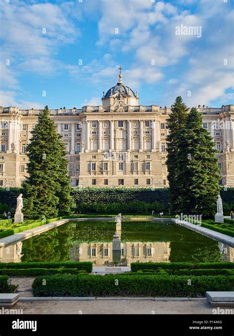 North facade of Royal Palace of Madrid (Palacio Real) at sunset. View ...