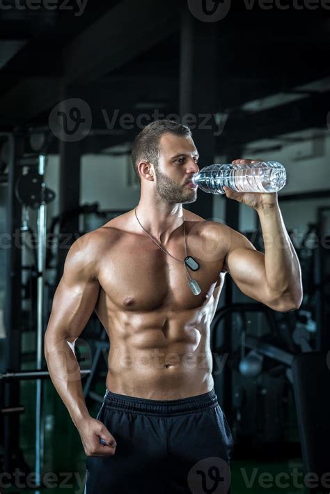 Man Drinking Water In Gym Stock Photo At Vecteezy