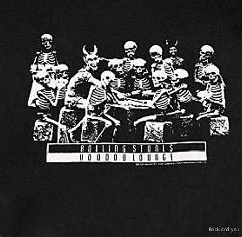 A Group Of Skeletons Sitting On Top Of Each Other In Front Of A Black