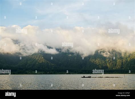 lake bratan at sunset in bali indonesia Stock Photo - Alamy