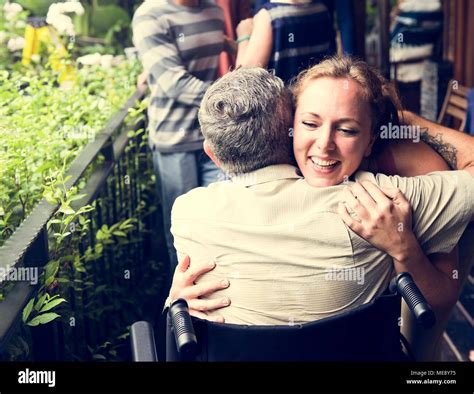 Friends hugging each other Stock Photo - Alamy