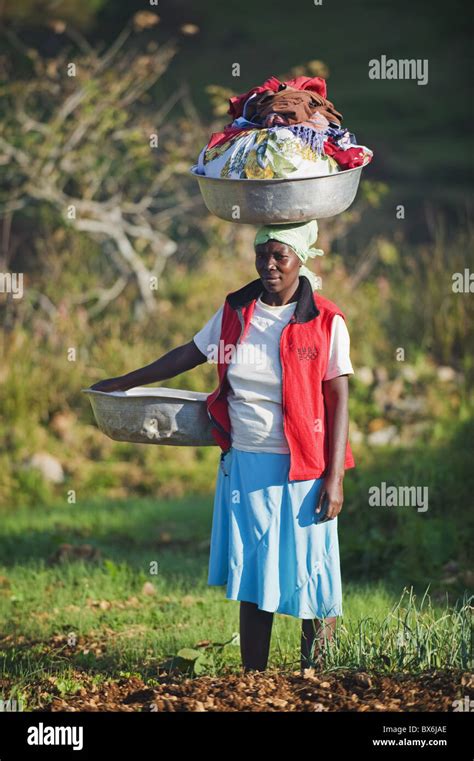 A Woman Carrying Washing On Her Head Kenscoff Mountains Above Port Au