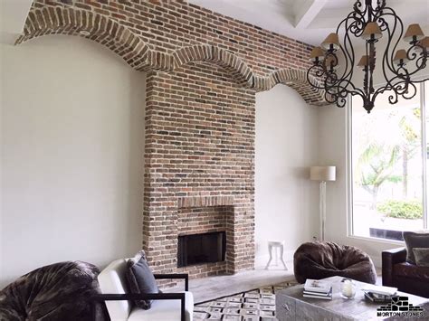 A beautiful brick veneer fireplace design. Brick Veneer, Fireplace Design, Veneers, Valance ...