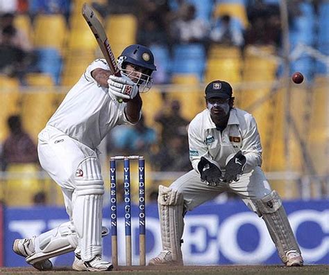 Yuvraj Singh Drives As Kumar Sangakkara Looks On Espncricinfo