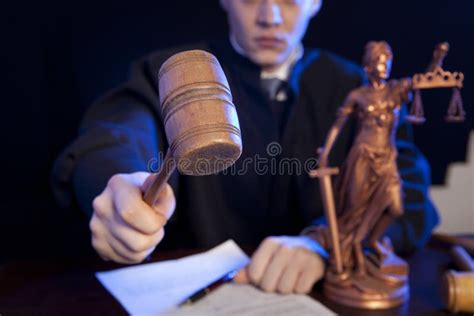 Male Judge In A Courtroom Striking The Gavel Stock Image Image Of