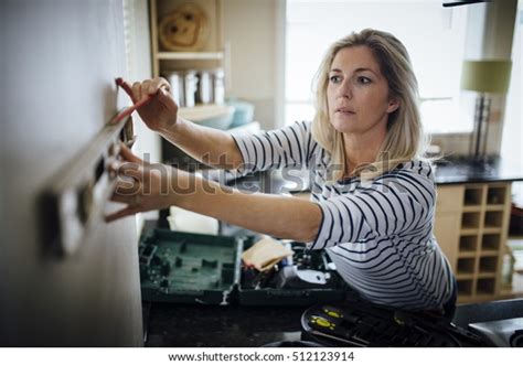 Mature Woman Using Spirit Level Marking Stock Photo Shutterstock